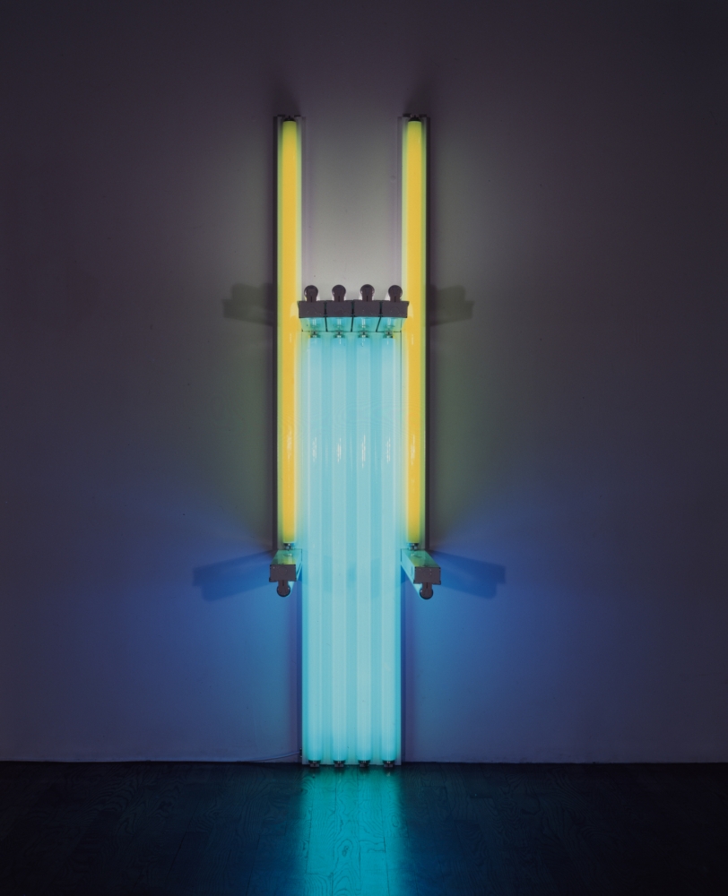 Fluorescent light sculpture in yellow. green, pink and blue by Dan Flavin