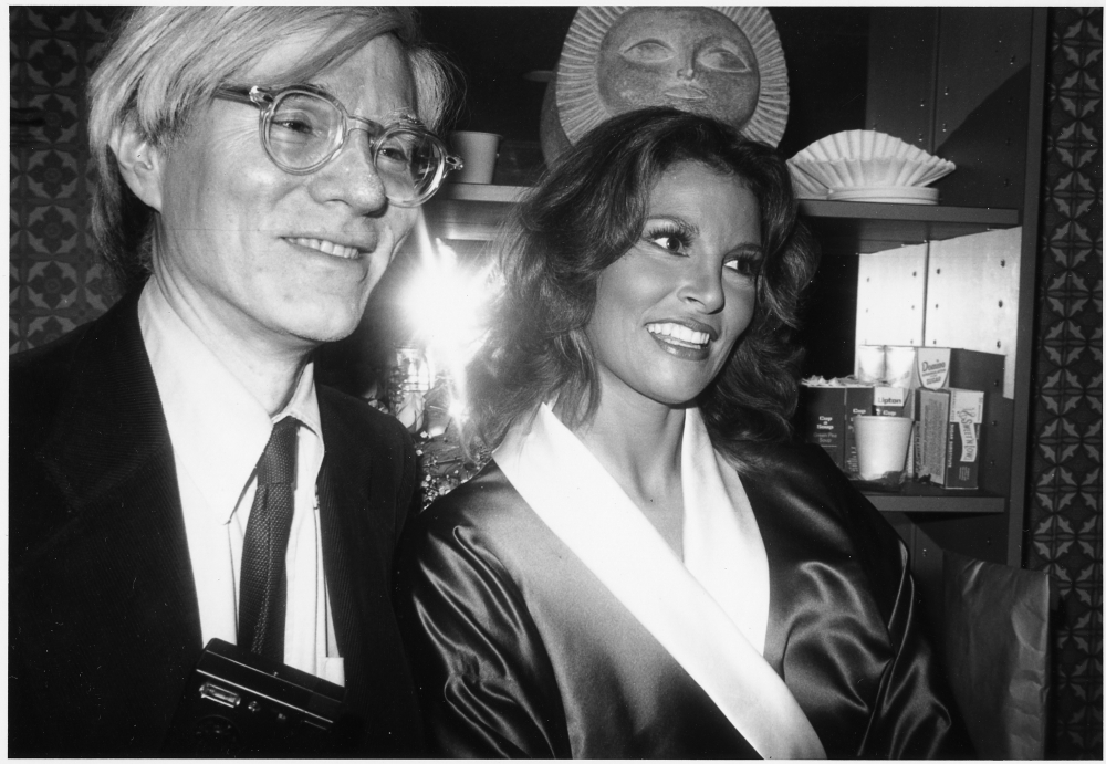 Andy Backstage with Raquel Welch by Bob Colacello