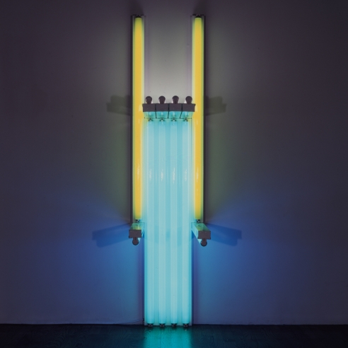 Fluorescent light sculpture in yellow. green, pink and blue by Dan Flavin